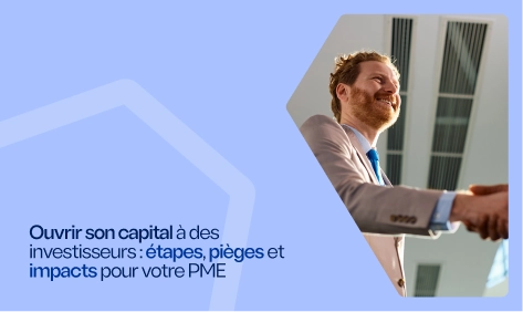 Dirigeant de PME serrant la main d’un investisseur lors d’une ouverture de capital